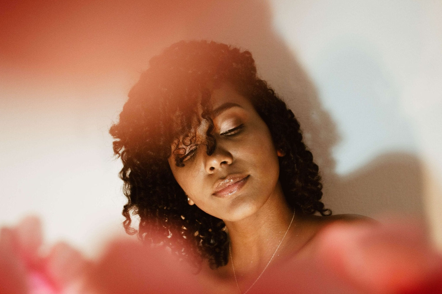 Woman with healthy, natural curly hair